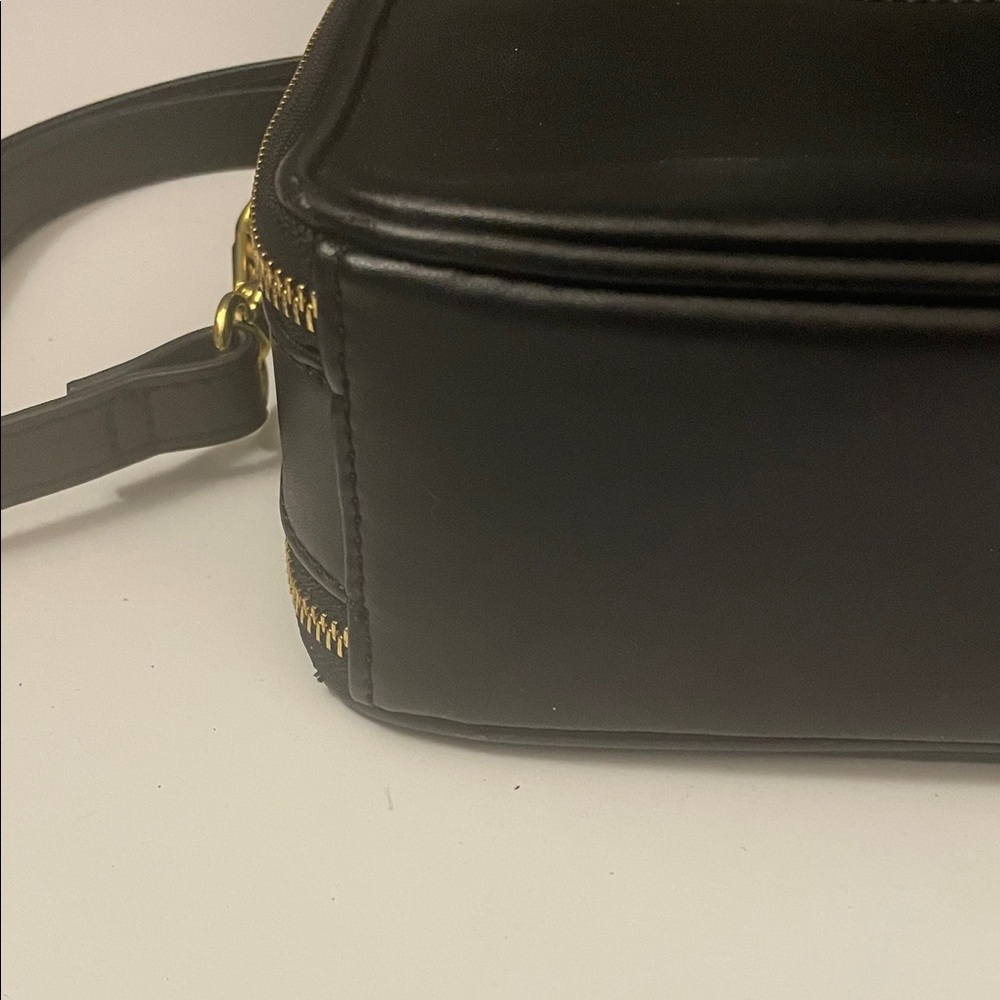 Elegant Black Crossbody Bag with Gold Accents - Picture 6 of 11